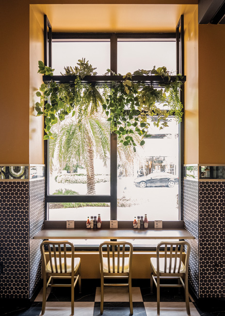 Window counter seats face downtown Sarasota’s busy Palm Avenue, the restaurant’s namesake.