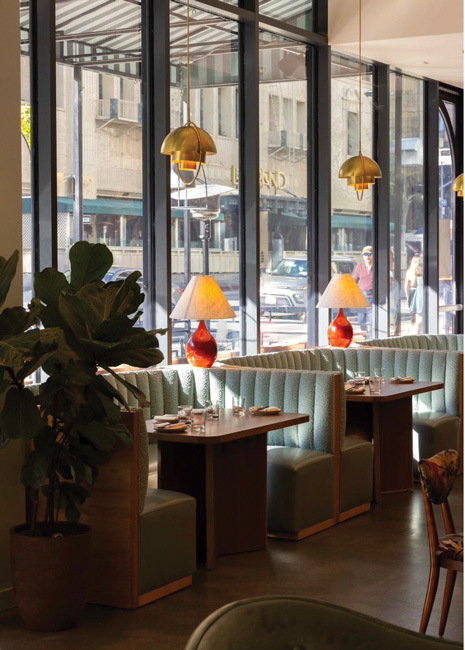 To create comfort and connectedness with art deco architecture in the neighborhood, the designer incorporated residential touches, deco shapes and vintage elements.