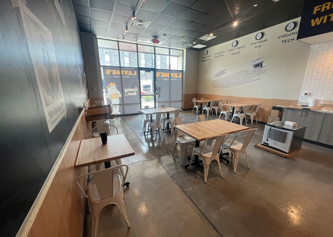 The clock wall on the far wall is one of Layne’s signature design elements. 