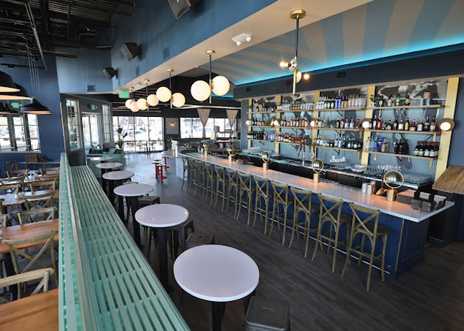 Blue Island Oyster Bar, designed by FAM Design, brings an urban vibe to the Denver suburbs. Image courtesy FAM Design