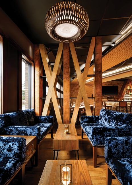 At Kanú, an adaptive reuse project in Old Town, Maine, Ervin’s team created unique wall and ceiling soffits that add texture, drama and a sense of unity between the various dining and lounge spaces. Images courtesy of Brandon Barré Photography