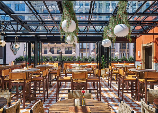 Coevál Studio used acoustic solutions to keep sound down at The Rooftop at Gilly's.  Image courtesy of John D'Angelo