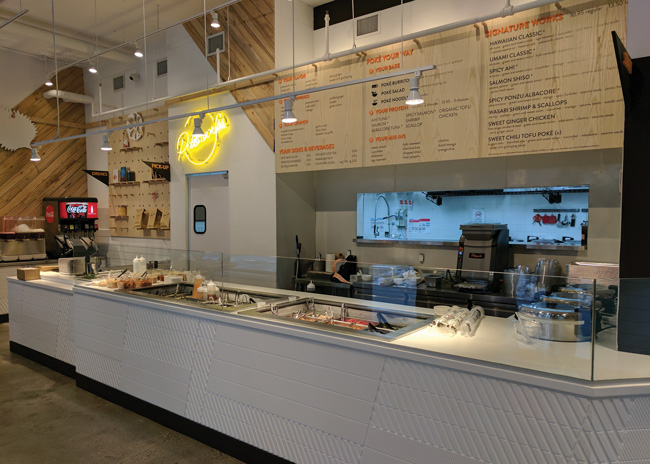 Key changes from the previous prototype, pictured here, included adding colorful tile to the front of the make line and upgrading to electronic menu boards.