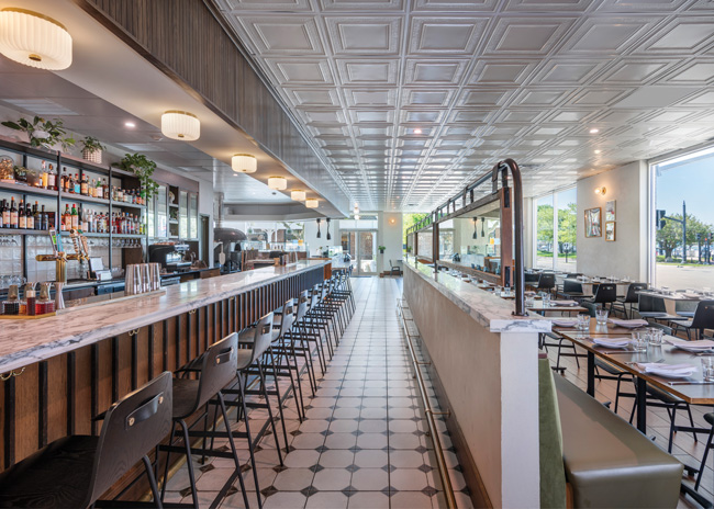 Mother Pizza has a somewhat formal dining room alongside a bar. The venue has a casual sit-down area in another room. Image by Nat Rea Photography