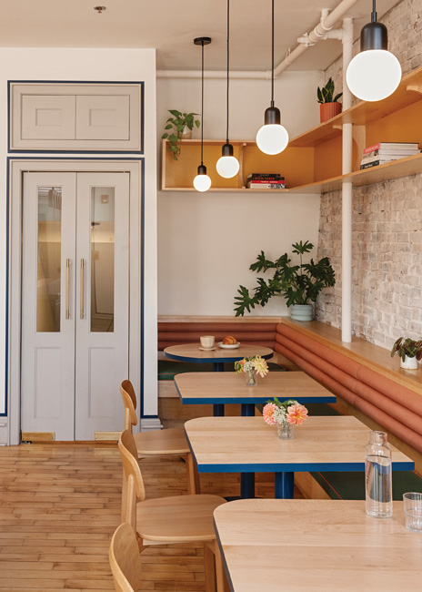 Carrie Dessertine likes small lighting moments that are less expensive than a large eye-catching chandelier. Image of Bread & Friends, Portland, Me., courtesy of Nicole Wolf