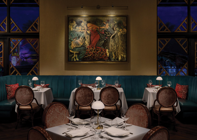 Texture, soft finishes, and warm lighting help to create the desired romantic, sultry-luxe vibe.