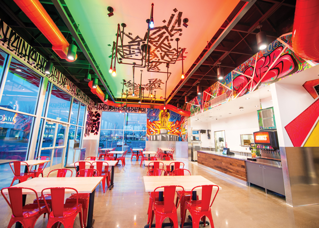 A vibrant experience at Dave’s is reflected through bold graffiti both inside and out.