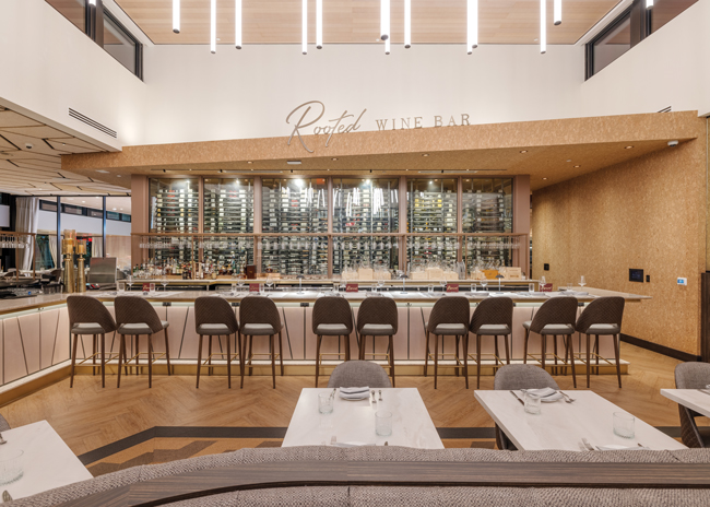 Rooted Wine bar provides a different type of steakhouse experience. The many unusual angles in the space recall mid-century modern design.